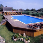 : above ground pool with deck cover