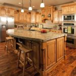 : hickory cabinets with backsplash