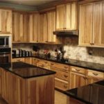 : hickory cabinets with dark countertops