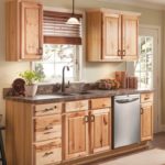 : hickory cabinets with marble countertops