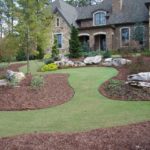 : landscaping rocks around house