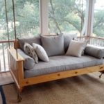 : porch swing and rocking chairs