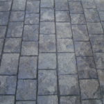 : stamped concrete stone walls