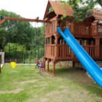 : wooden swing sets with rock climbing wall
