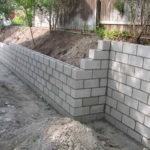 : cinder block retaining wall rebar