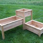 : wooden planter boxes with trellis